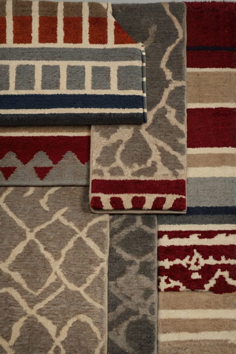 rug options,area rug design,rug placement in living room,modern rug ideas,layered rugs in living room,stylish rug choices,living room rug trends